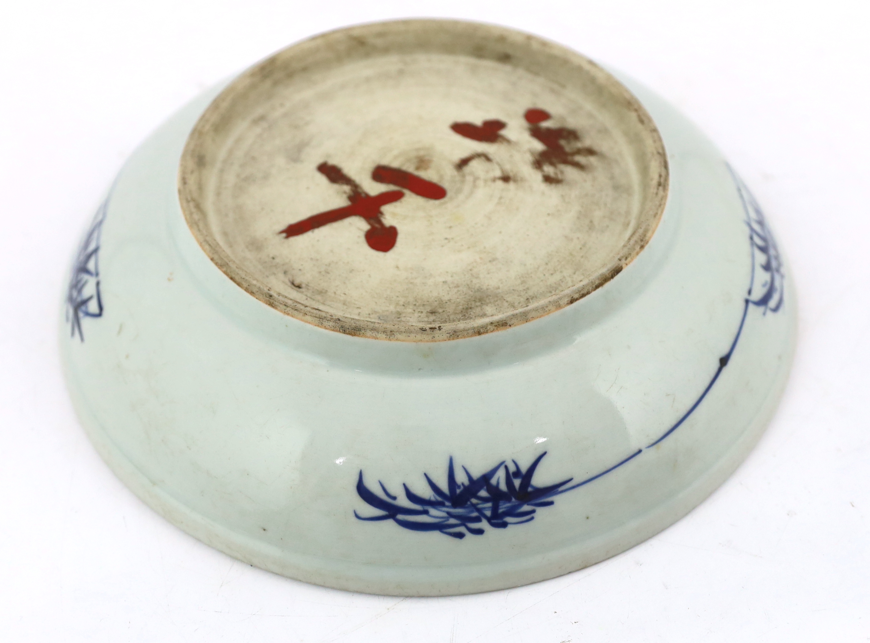 A large Chinese blue and white ‘mythical beasts’ saucer dish, Yongzheng period